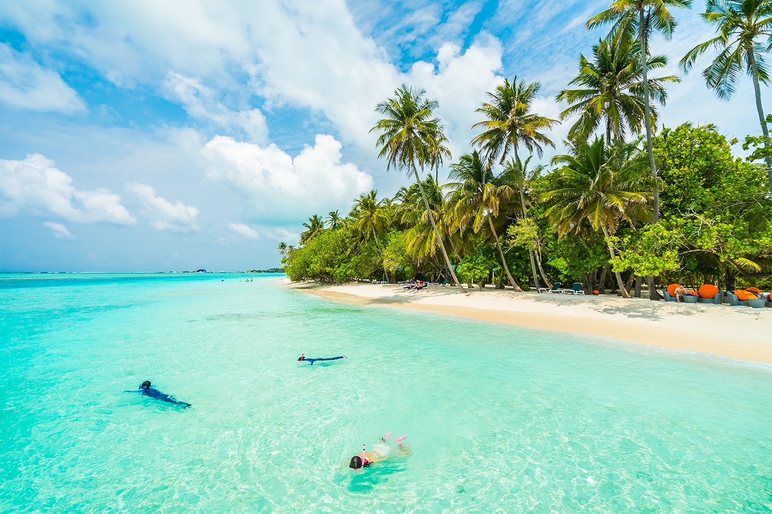 Diani Beach Kenya with white sand, palm trees and turquoise Indian Ocean